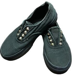 Black VANS with gold studs